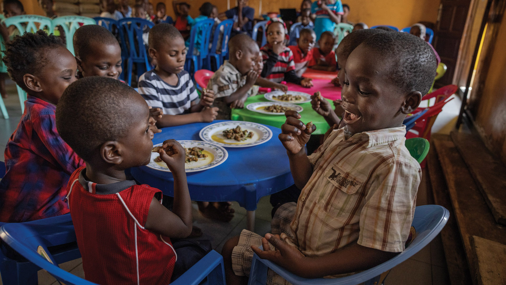 Children receiving meals at Mushawevana Children's Home in Marondera